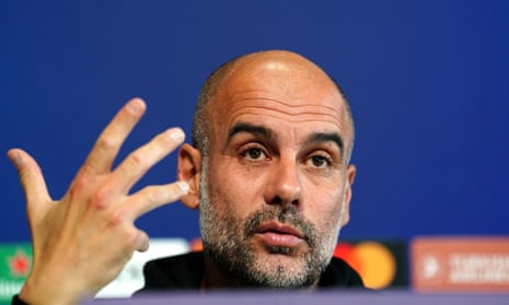 Pep Guardiola speaks to the press