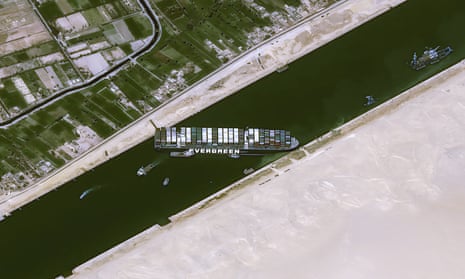 The Taiwan-owned MV Ever Given container ship lodged sideways and impeding all traffic across the waterway of Egypt’s Suez canal