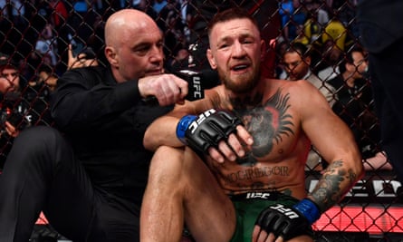 Rogan interviewing Conor McGregor in the ring
