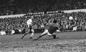 Greaves slots the ball past the Stoke City goalkeeper Gordon Banks in November 1968 for his 200th League goal for Tottenham. When Greaves left Spurs in 1970 he had a club record total of266 goals, including 15 hat-ricks, another club record. Such was the esteem he was held in by the club that Spurs gave Greaves a testimonial against Feyenoord at White Hart Lane in October 1972 which the London club won 2–1