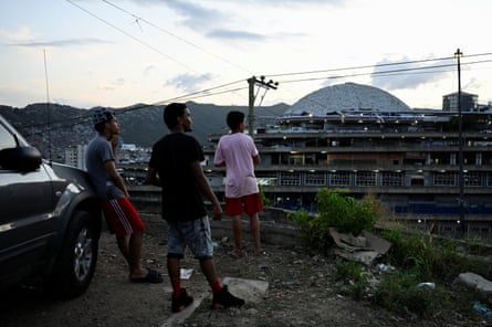 people standing by a building