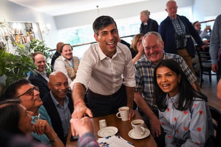 Rishi Sunak, his wife Akshata Murty and Bob Blackman, Conservative MP, attend a campaign event in London