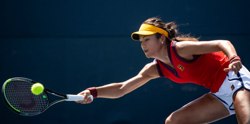 Emma Raducanu hits a forehand against Bibiane Schoofs in the first qualifying round of the US Open