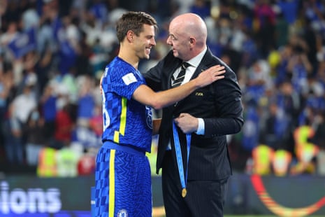 Azpilicueta collects his gold medal from FIFA President Gianni Infantino.