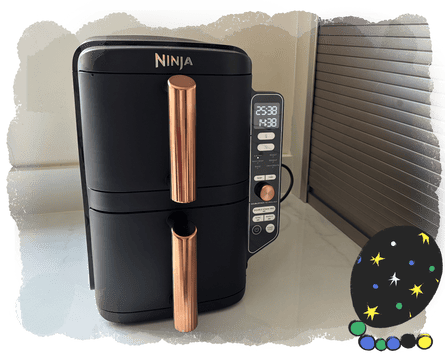 A Ninja air fryer on a kitchen counter