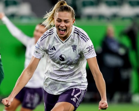 Fridolina Rolfö wheels away in celebration after opening the scoring at Wolfsburg.