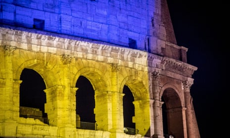 The Colosseum illuminated in the colors of the Ukrainian flag, Rome.