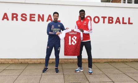 Arsenal’s manager, Mikel Arteta, with Thomas Partey.