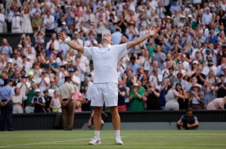Arthur Fery stretches his arm in celebration after victory over Grigor Dimitrov in five sets on Centre Court during Wimbledon 2026