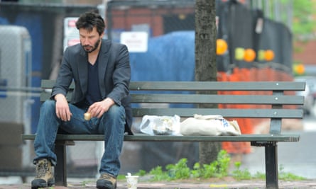2010 photo of Keanu Reeves on a New York bench that sparked what became known as the Sad Keanu meme.
