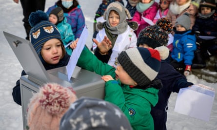 Preschoolers vote in Lausanne during a practice run at the country’s direct democratic system.