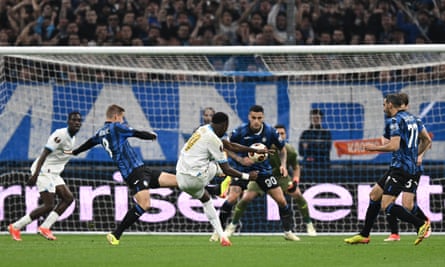 Chancel Mbemba equalises from long range for the hosts in Marseille.
