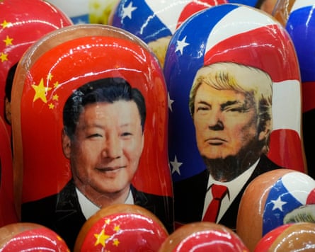 Traditional Russian wooden dolls depicting China’s president Xi Jinping and US president Donald Trump.