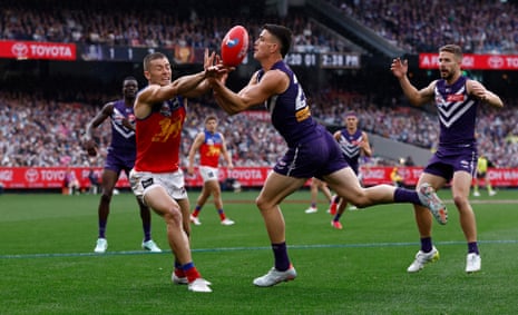 Patrick Voss and Josh Dunkley compete for the ball.