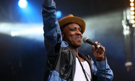 Eddie Amoo of the Real Thing performing on stage at the Wychwood festival in Cheltenham in 2014.