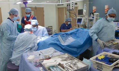 NHS staff in an operating theatre.
