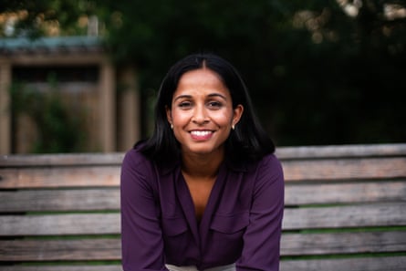 a woman in a purple shirt