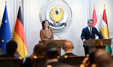 Annalena Baerbock and the Kurdistan region’s prime minister, Masrour Barzani, hold a joint press conference in Erbil,.