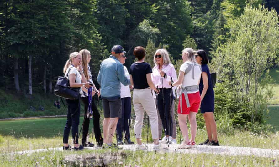 Partners of G7 leaders, Brigitte Macron, Britta Ernst, Carrie Johnson, Amelie Derbaudrenghien and Heiko von Der Leyen receive Nordic Walking instructions by former German biathlete and cross country skier Miriam Neureuther and former German Alpine skier Christian Neureuther