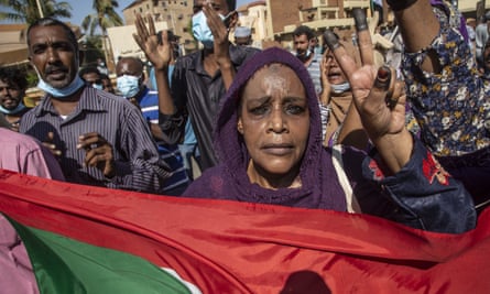 Sudanese people demonstrate, demanding the end of the military intervention.