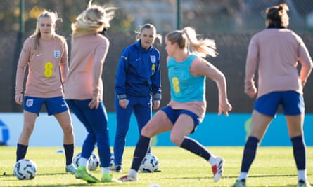 England Women manager Sarina Wiegman (centre) prepares the Lionesses for their Euros title defence.