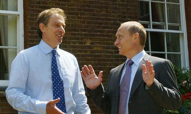 Tony Blair and Vladimir Putin standing on the patio in the garden of No 10 Downing Street in 2003.