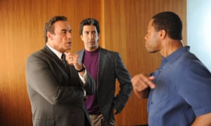 From left, John Travolta as Robert Shapiro, David Schwimmer as Robert Kardashian, and Cuba Gooding Jr as O J Simpson.