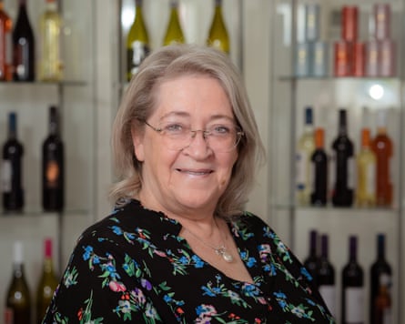 Veronica Cleary with wine cases in the background