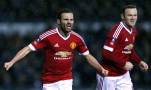 Goalscorers Juan Mata and Wayne Rooney celebrate after Mata added the third.