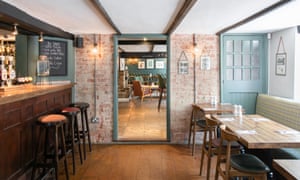 Bar and dining area at the Castle Inn, West Lulworth, Dorset, UK.
