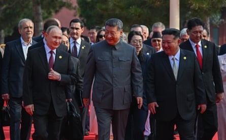 Xi Jinping, Vladimir Putin and Kim Jong-un arrive at a reception in Beijing