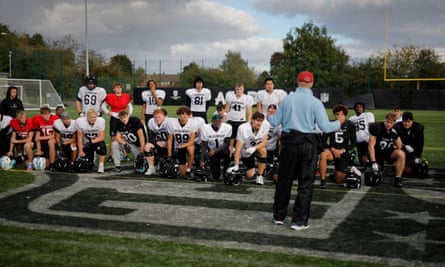 The Academy head coach Steve Hagen speaks to his players after a training session for the NFL Academy at Loughborough University.