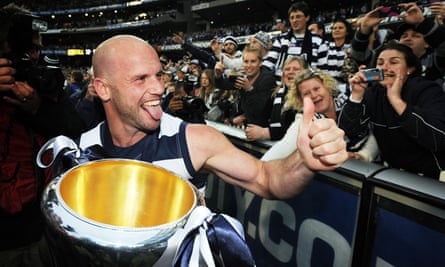 Geelong’s Paul Chapman celebrates with the crowd after defeating Collingwood at the MCG in the 2011 grand final.