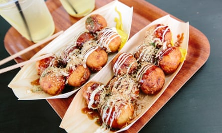 Having a ball … takoyaki octopus dumplings on Dotonbori.