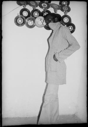 Je suis fou de disques, 3 novembre 1973, by Malick SidibéMalick Sidibé Sidibe, who died in 2016, lived and worked in Bamako, Mali. He opened his own photography studio, Studio Malick, in the centre of Bamako in 1958. He was part of a generation of photographers who were totally involved in the cultural and social life that they recorded. Spontaneity emerges from his photos: he captured the playful partying, full of laughter and life. He quit this activity in 1978, but continued his studio photography.