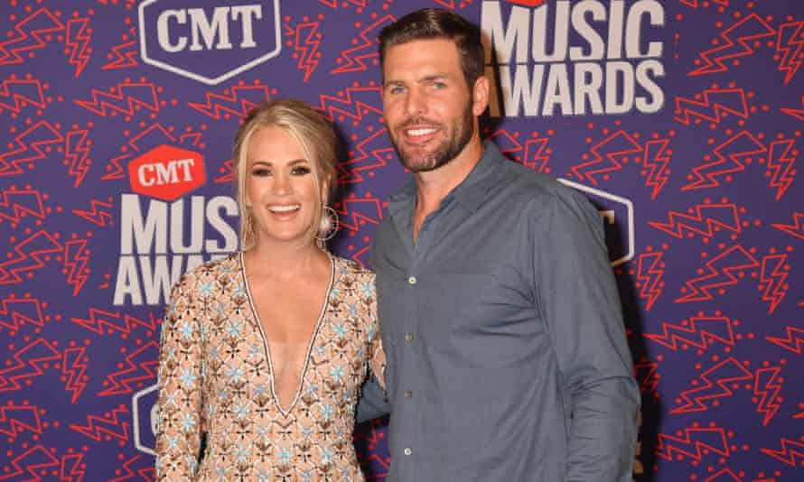 Underwood and husband Mike Fisher at the CMT music awards in Nashville, earlier this month.