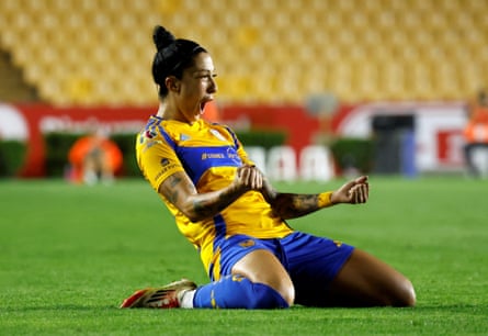 Jenni Hermoso celebrates on the pitch at a match with her team, Tigres UANL.