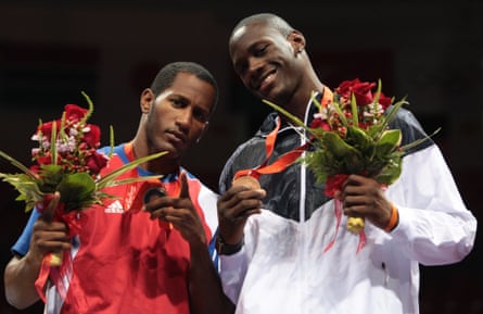 Deontay Wilder, right, less than two years after boxing for the first time.