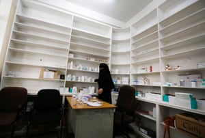 A worker is pictured in a government hospital’s drug store in Sana’a, Yemen