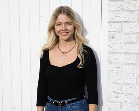 Sophie Pender next to white door with lock