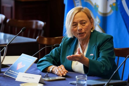 Janet Mills speaking at a meeting.