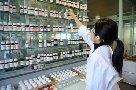 A student works in a Parisian perfume school.
