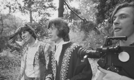 Peter Whitehead, right, with Mick Jagger, centre, and Keith Richards during the filming of We Love You in 1967.