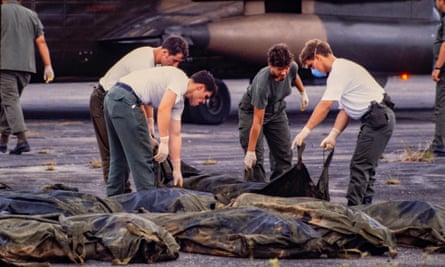 US military personnel remove American bodies from Jonestown, Guyana, for repatriation.