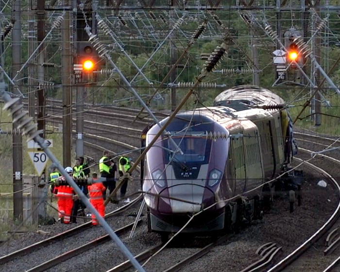 Emergency services attend to injured after two trains collide near Bedford – video