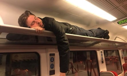 A man sleeps after being trapped on train