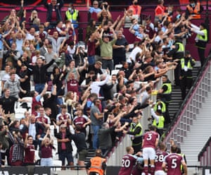 Pablo Fornals of West Ham United celebrates scoring the first goal with team mates in front of the jubilant West Ham United fans.