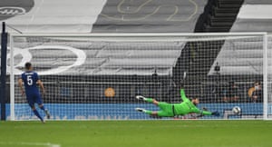 Chelsea’s Jorginho scores a penalty during a penalty shootout.