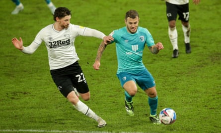 Jack Wilshere, pictured in action against Derby, believes he is most effective in a deeper position.