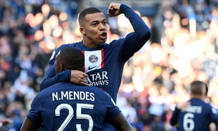 European roundup: Milan go second after own goal as Mbappé sparks PSG rout | European club football 2 Kylian Mbappé celebrates with Nuno Mendes after scoring PSG’s first goal against Auxerre